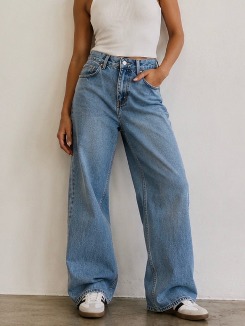 BDG medium wash boyfriend jeans featuring a high-waisted design
